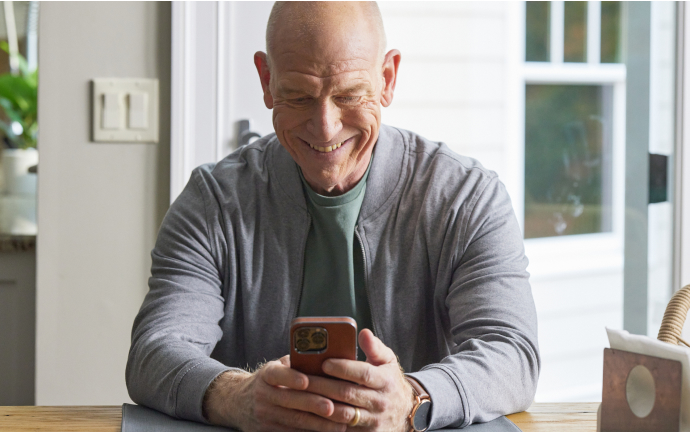 a man using his smart phone