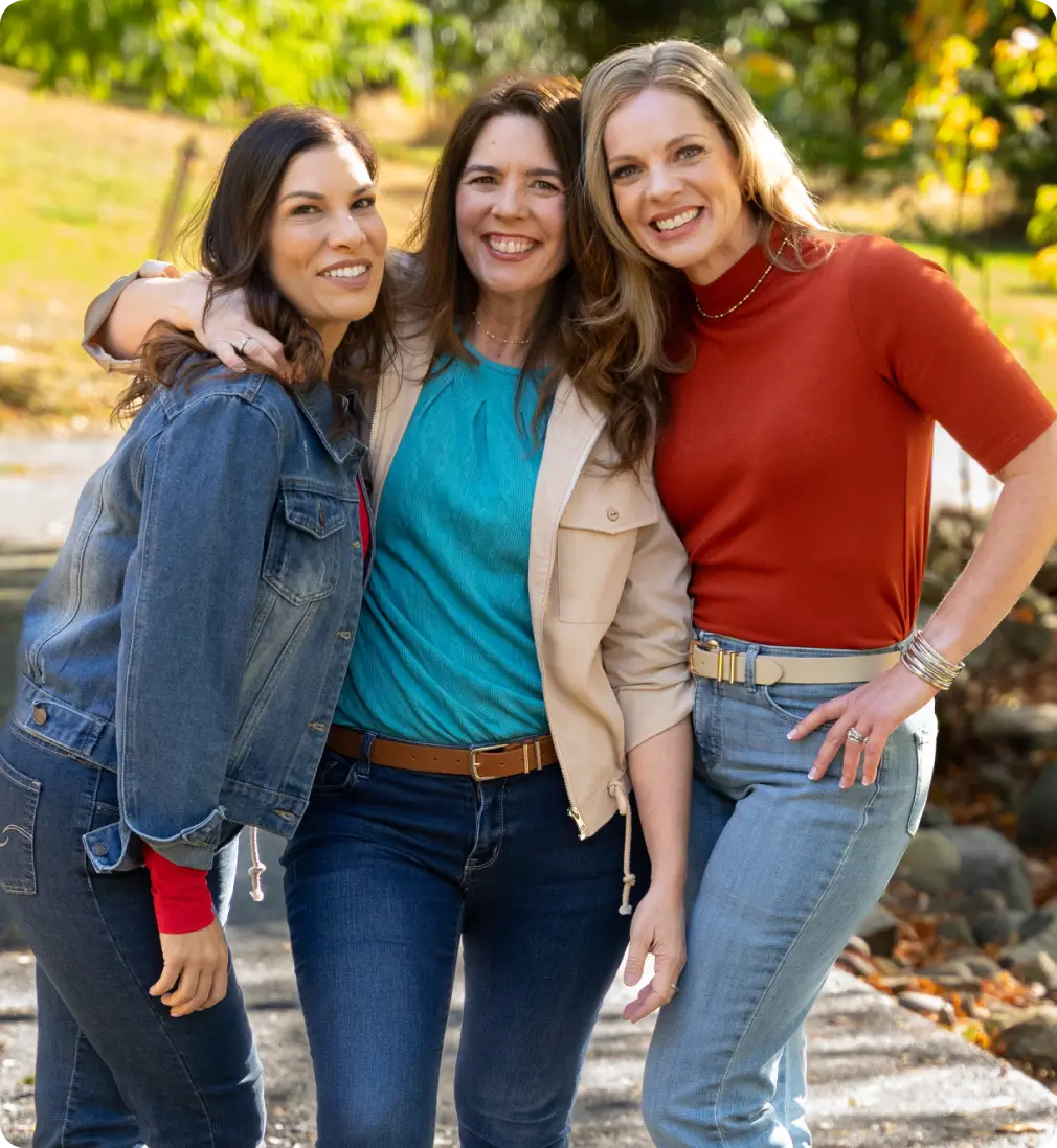 three women customers smiling