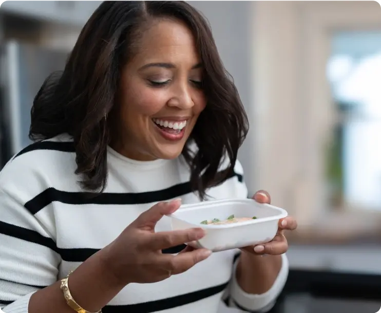 woman holding meal